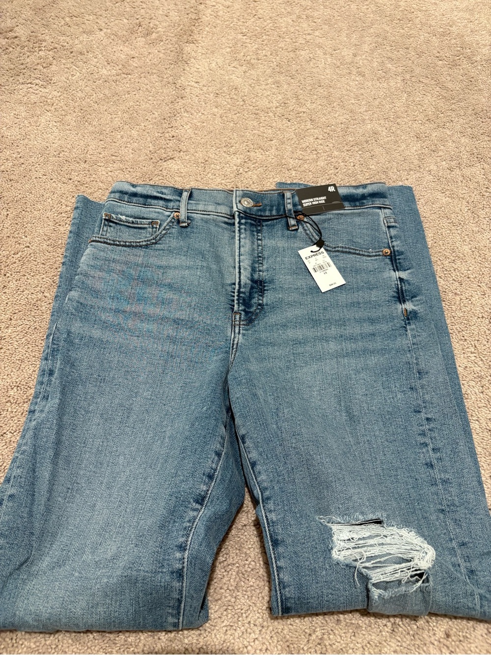 Express Light Blue Skinny Jeans with Distressed Knee